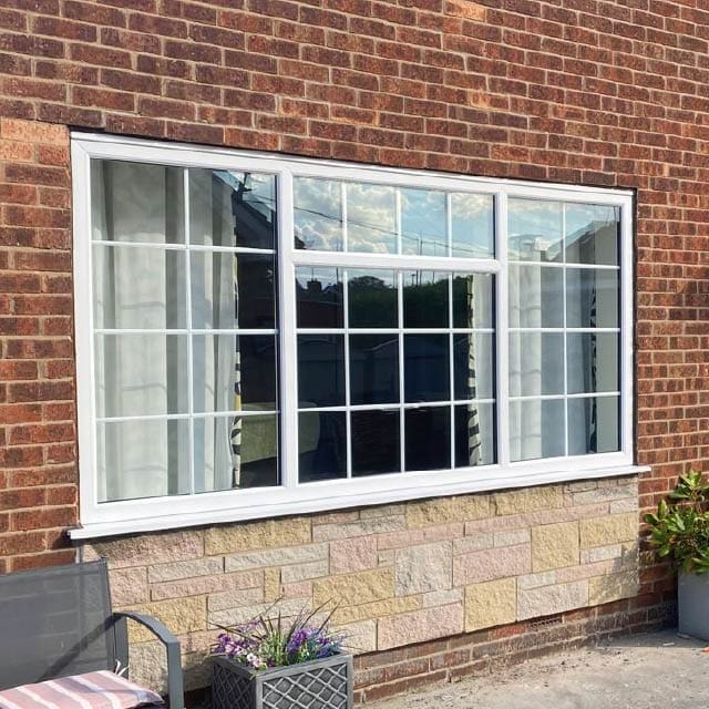 White UPVC windows with Georgian bar